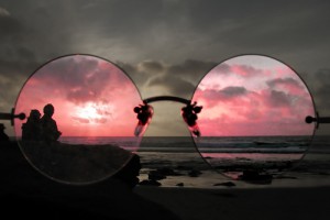 large-rose-colored-glasses-on-beach